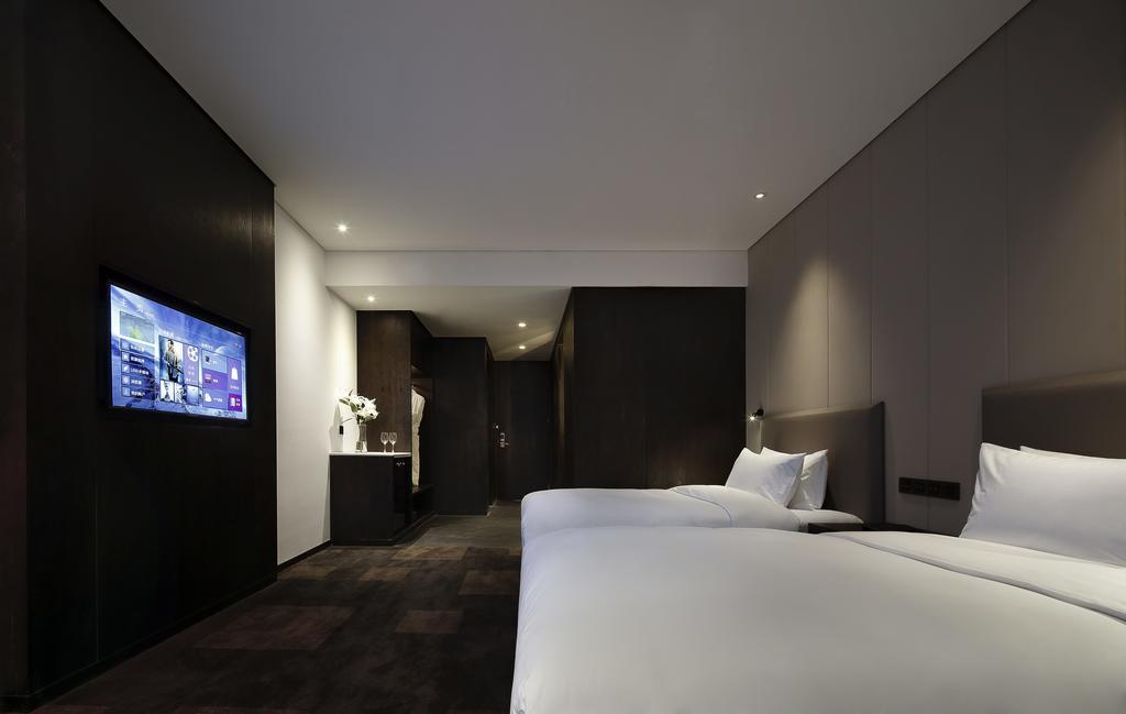 Hotel Ease House Luoyang Luo-jang Pokoj fotografie