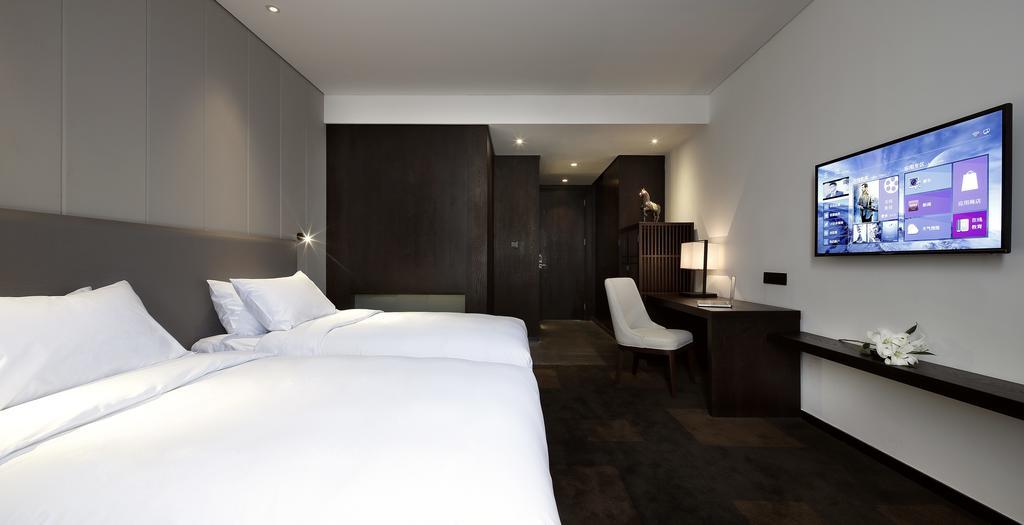 Hotel Ease House Luoyang Luo-jang Pokoj fotografie